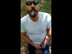 Beard daddy with cigar cums in forest